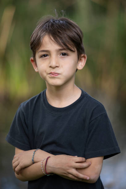 istock Portraits of a serious 9 year old boy 1887269453