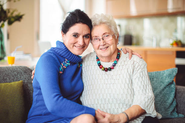 istock Social worker is visiting a senior woman 1887294211