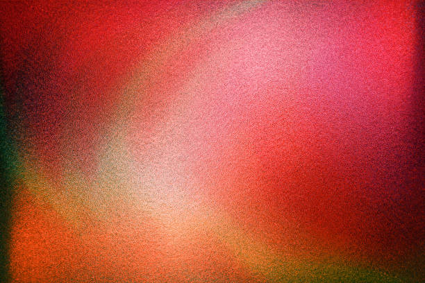 istock Color gradient dark grainy background, red orange yellow vibrant abstract on black, noise texture effect 1887315129