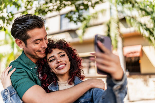 istock Couple taking a selfie in the city 1887412037