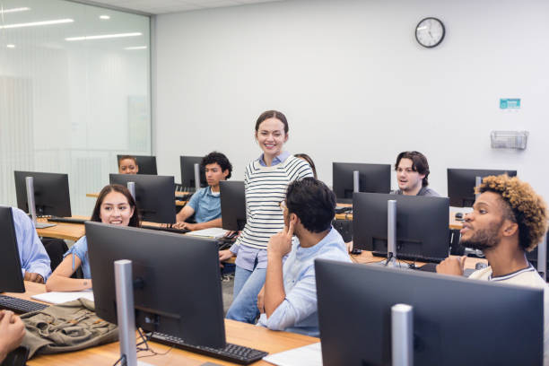istock Diverse group of employees meet in the computer lab 1887420420