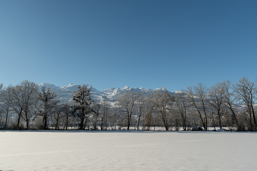 Vaduz, Liechtenstein, December 3, 2023 Heavenly winter mood in the rhine valley on a sunny day with a clear blue sky