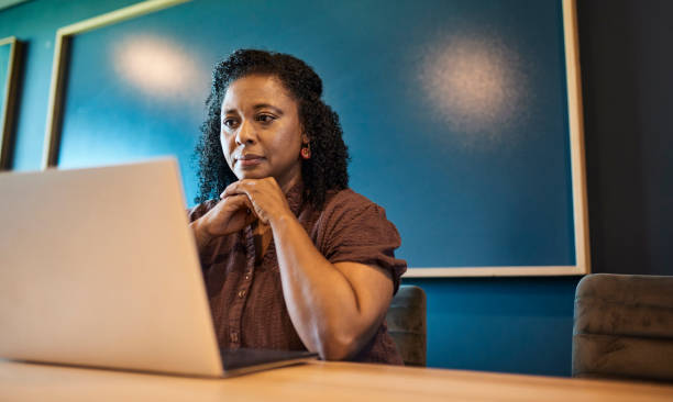 istock Focused Black Woman Working on Laptop 1887447991
