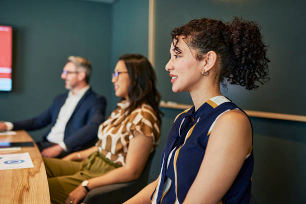 istock Confident Professionals in a Business Meeting 1887449073