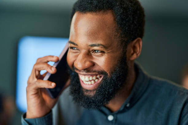 istock Businessman smiling during a phone call 1887449618