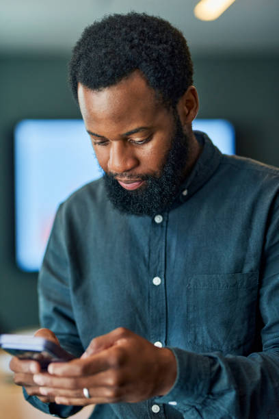 istock Businessman Checking Phone 1887449625