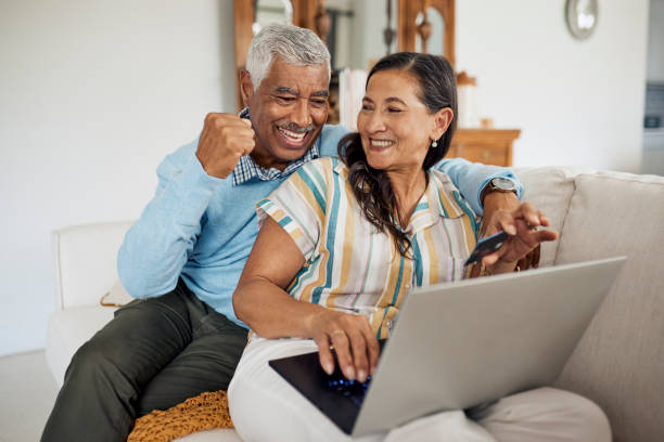 istock Happy Couple Shopping Online 1887467550