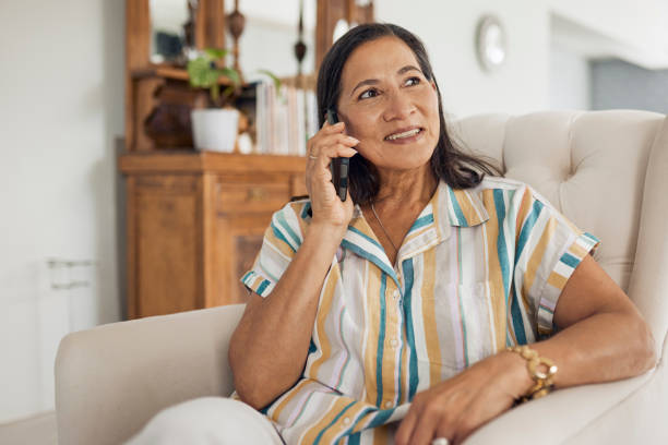 istock Elegant Woman Chatting on Phone 1887468070