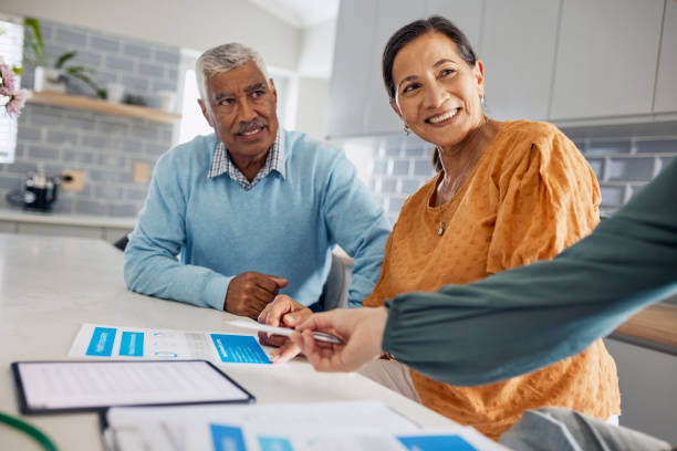 istock Couple Meeting With Financial Advisor 1887468078