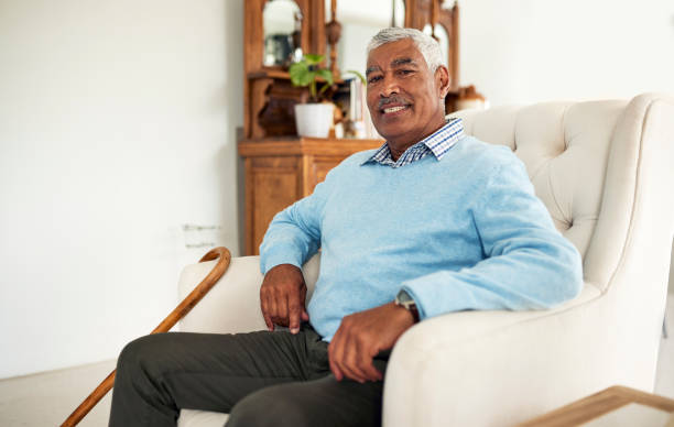 istock Confident senior man relaxing in armchair 1887469194
