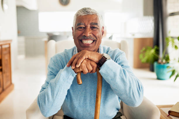istock Happy senior man at home 1887469206