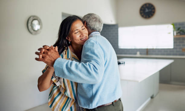 istock Happy Couple Dancing in Kitchen 1887469743