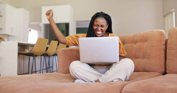 istock Thoughtful Woman Working on Her Laptop 1887470865