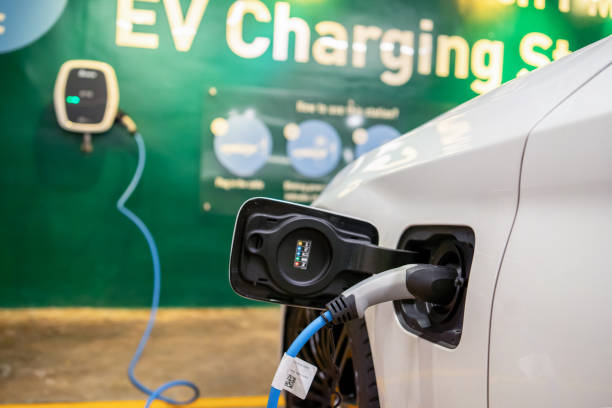 istock electric car charging on wallbox 1887470875