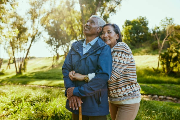 istock Happy Couple Embrace In Nature 1887472559