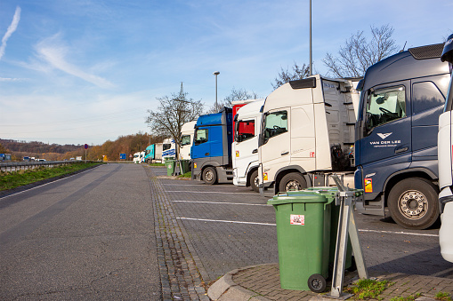 Montabaur, Germany - November 22, 2023: Parked trucks on German rest area Montabaur. Many rest areas are completely overloaded due to the high truck traffic density in Germany