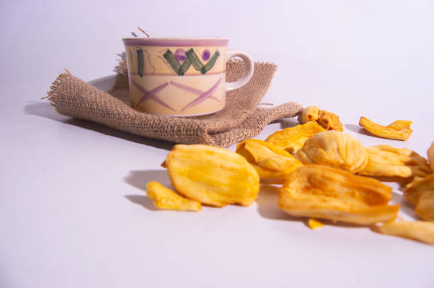 jackfruit chips with white background. dry jackfruit. roasted jackfruit. food products from jackfruit.