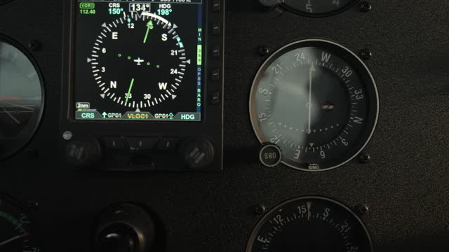 Close Up Airplane Navigation Instruments - Digital HSI during Turn