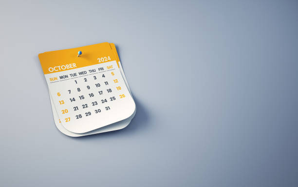istock Yellow October 2024 Calendar On Smoked Background, Blue Pushpin Pinned 1887513647