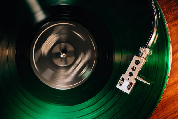 Classic vinyl record, turntable spin, analog sound, music concept. Celebrating retro vibes, vintage aesthetics. Macro dynamic motion. Iconic imagery. High quality