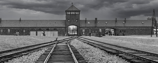 Brzezinka, Poland - July 17, 2023: The entrance of the notorious Auschwitz II-Birkenau former Nazi extermination camp and now a museum