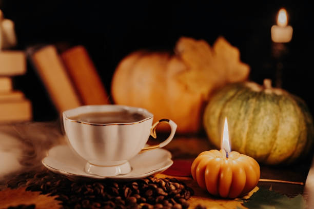 istock Comforting charm, autumn coffee scene. Nostalgic, retro allure. Candles flicker. 1887665586