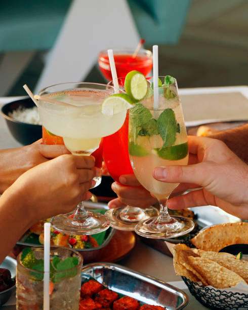 istock group of people celebrating and gathering with drinks 1887719095