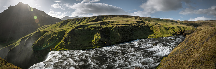 Panoramic view at the top of Skógafoss waterfall overlooking the Skógá river.