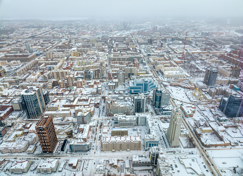 A high angle view over Quebec City, covered in snow.\
