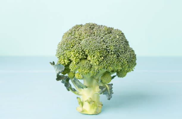 istock Fresh tasty broccoli on wooden table 1887885541