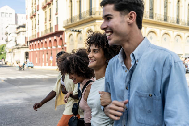 istock Friends walking through the city 1887887105