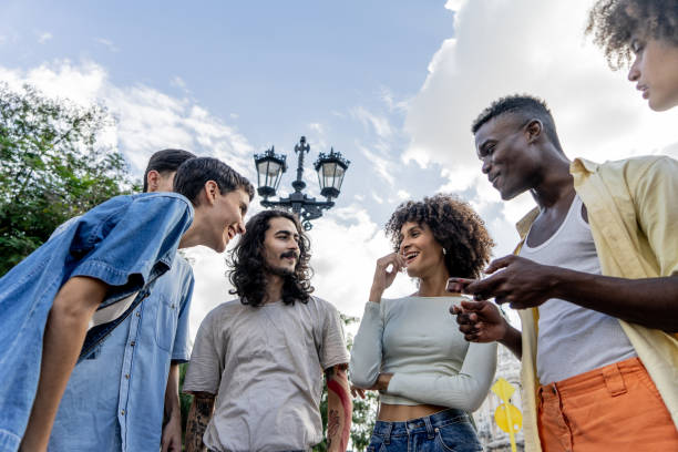 istock Friends talking on the street 1887887363