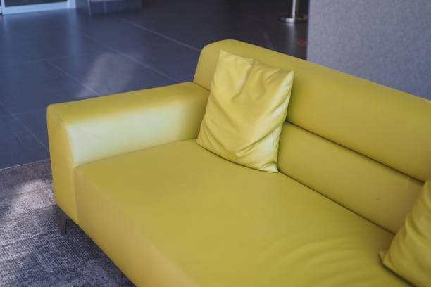 istock modern sofa with pillows in living room at home 1887893797