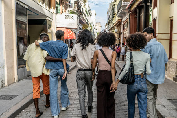 istock Friends walking through the city 1887929568