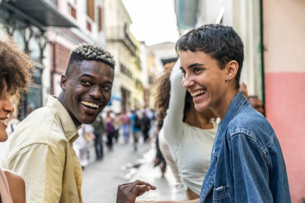 istock Happy friends talking on the city 1887930101