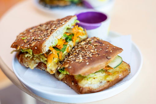 Toasted sandwich with avocado and vegetables
