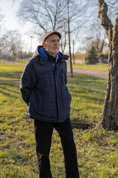 istock Senior man is enjoying a walk on autumn day. 1887947244