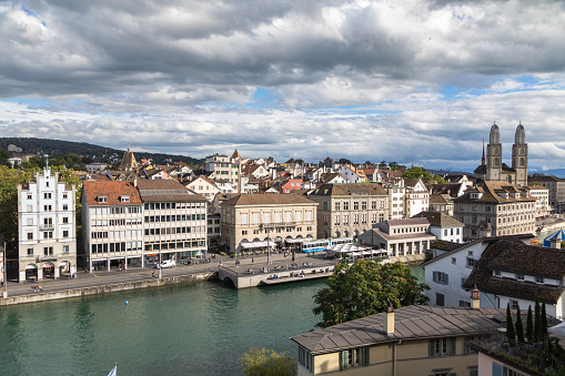 HDR image of the view over Luzern, Switserland. The natural museum and spreuerbrucke can be seen and the mountains in the background