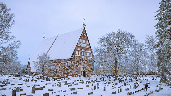 The historic Ingjaldshóll Church on top of the hill in Wintertime. The church at Ingjaldsholl serves the villages Hellisandur and Rif and is the oldest concrete church in the world. Christopher Columbus seems to have stayed at Ingjaldshóll during the winter of 1477-78. Ingjaldshólskirkja - Ingjaldsholl Church, Snæfellsnes Peninsula in West-Iceland, Iceland, Northern Europe.