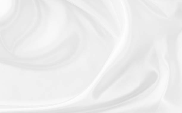 istock White gray satin texture that is white silver fabric silk background with beautiful soft blur pattern natural. 1888006230