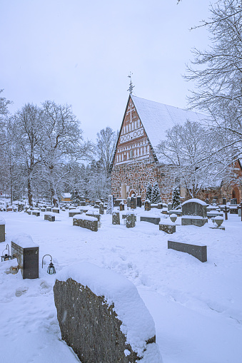 Lahti, Finland. December 25th, 2023. One of the oldest churches in Finland, originally catolic nowadays protestant covered by snow.