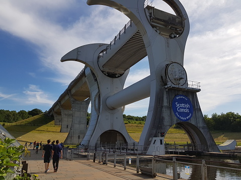 Falkirk Wheel - a rotating boat lift connecting the Forth and Clyde Canal with the Union Canal, Falkirk, Scotland UK