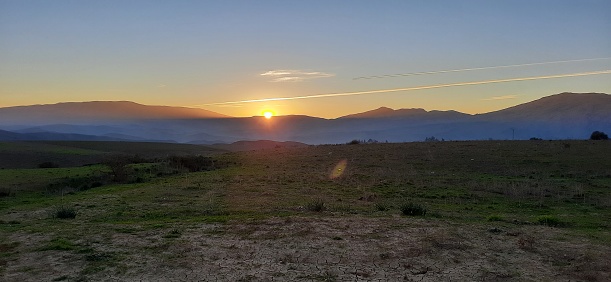 Sunset in the foothills of temzguida in west medea mountains in algeria