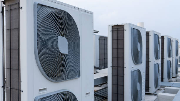 istock Multiple air condition outdoor unit on a apartment roof top 1888126021