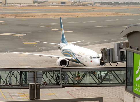 Muscat, oman- November 21,2023: oman air airplane getting ready to take off from muscat international airport