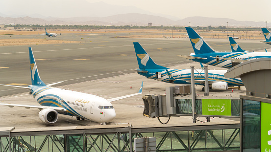 Muscat, oman- November 21,2023: multiple oman airplane at muscat international airport