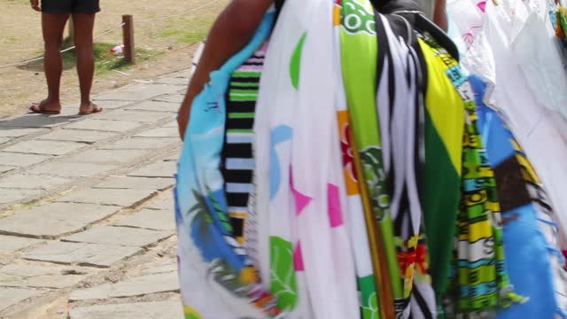 a person selling sarong