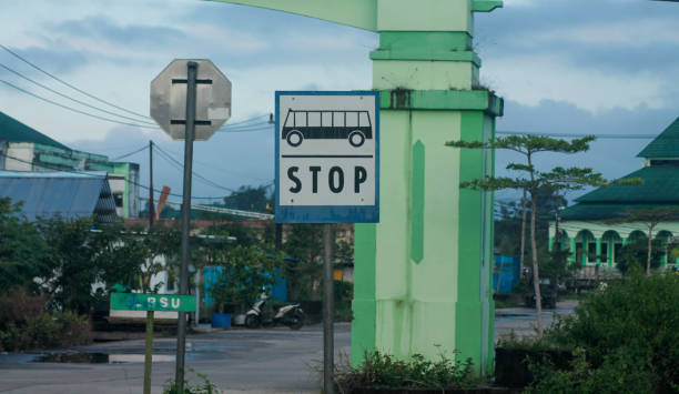 istock Bus Stop Sign on post pole, traffic road roadsign 1888193051