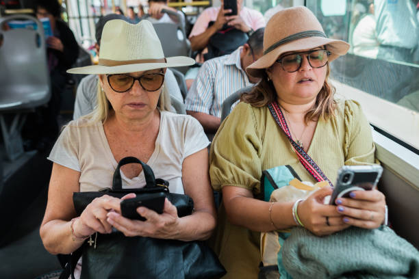 istock Tourists on their cell phones. 1888210015