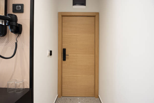 istock Hotel room corridor with doors 1888231139